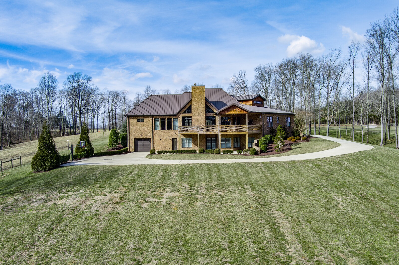 4250 Moss Road Baxter, TN 38544 - Photo 25 of 69 a view of a house with a yard table and chairs