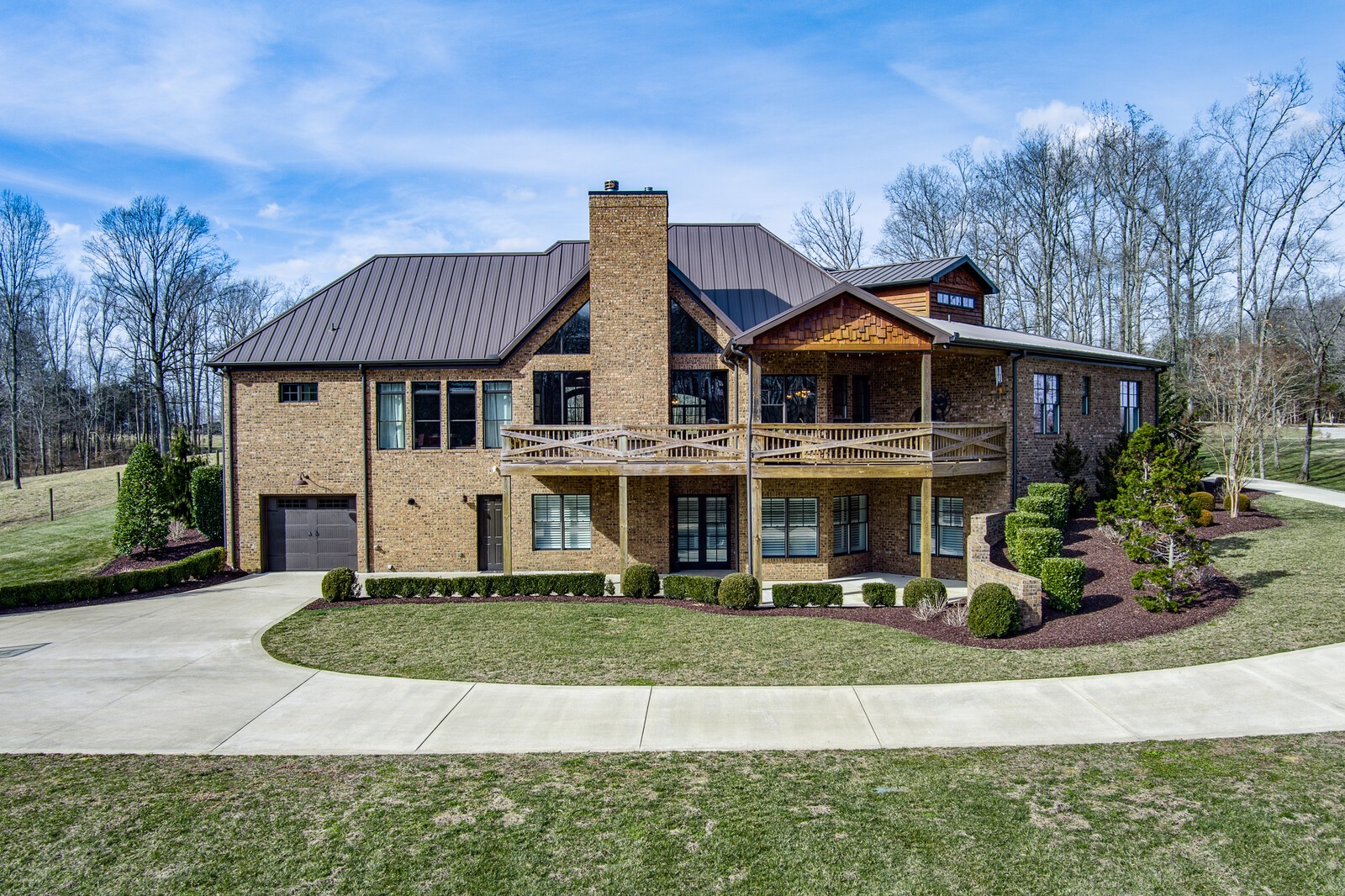 4250 Moss Road Baxter, TN 38544 - Photo 26 of 69 a front view of a house with a yard