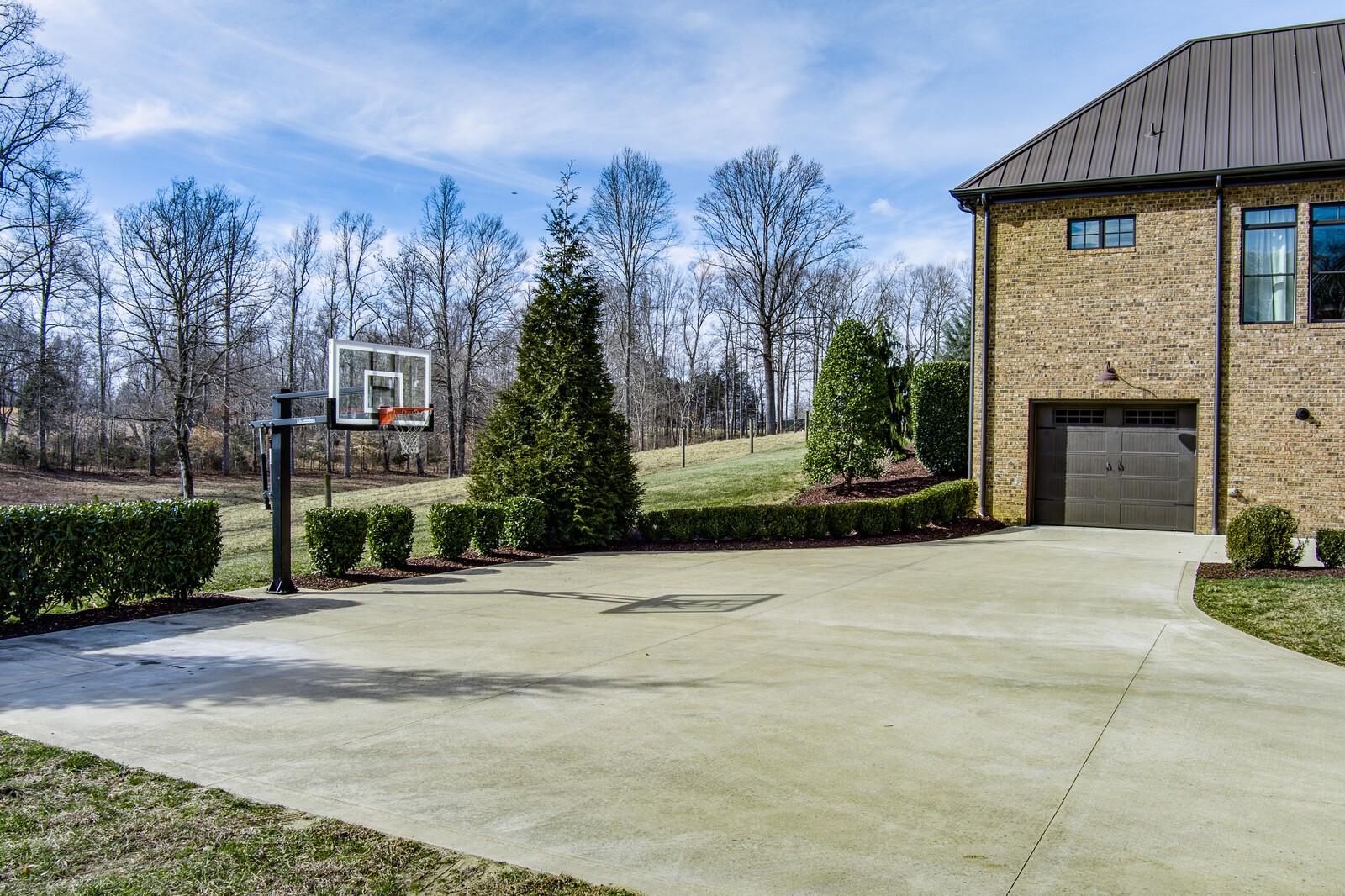 4250 Moss Road Baxter, TN 38544 - Photo 27 of 69 a front view of a house with yard and trees