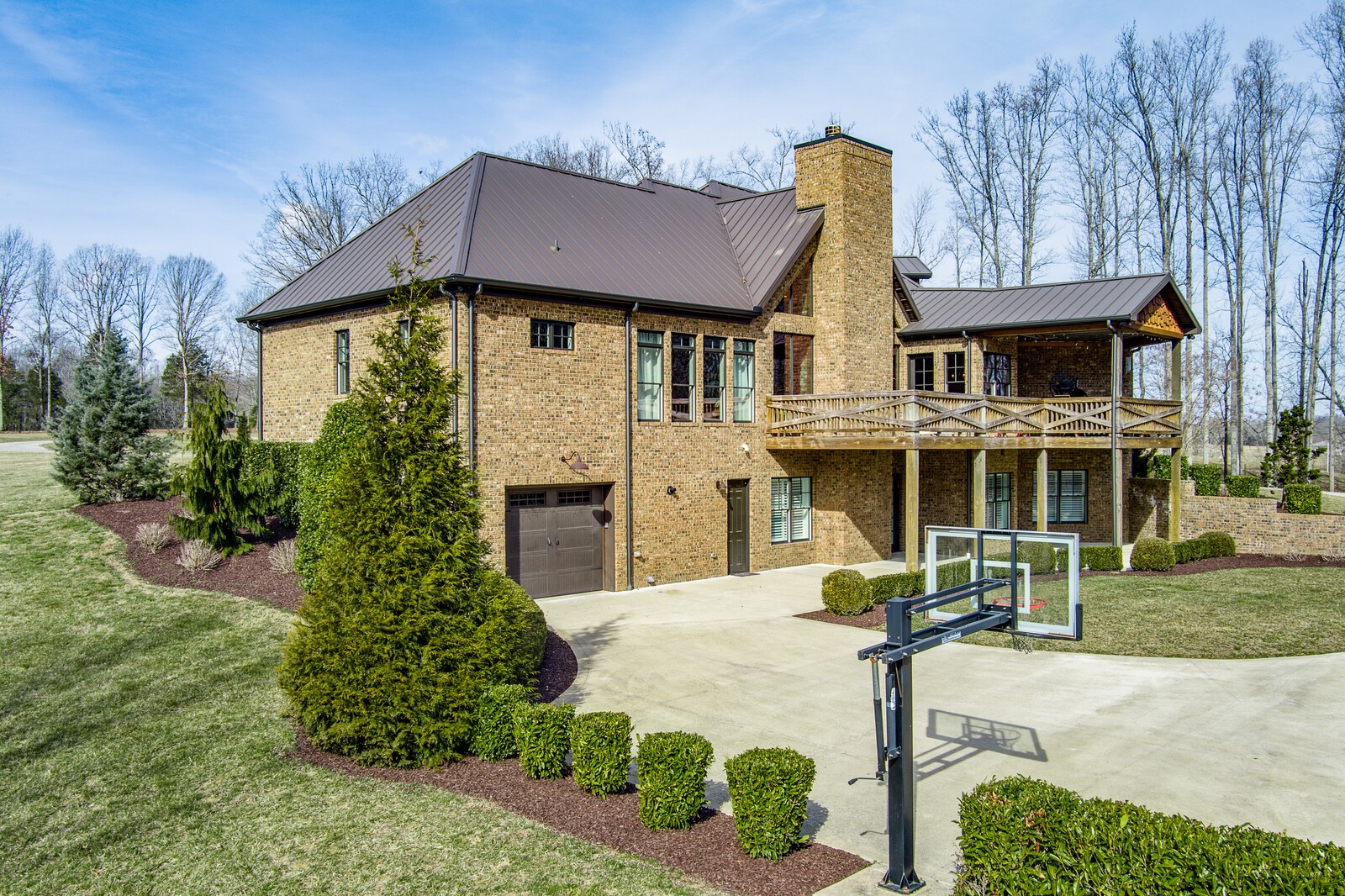 4250 Moss Road Baxter, TN 38544 - Photo 28 of 69 a front view of a house with garden