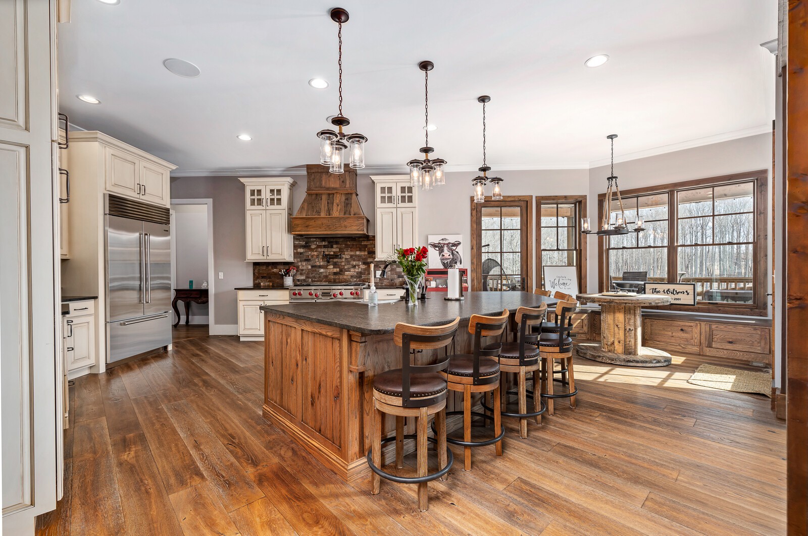 4250 Moss Road Baxter, TN 38544 - Photo 3 of 69 a large kitchen with a table and chairs
