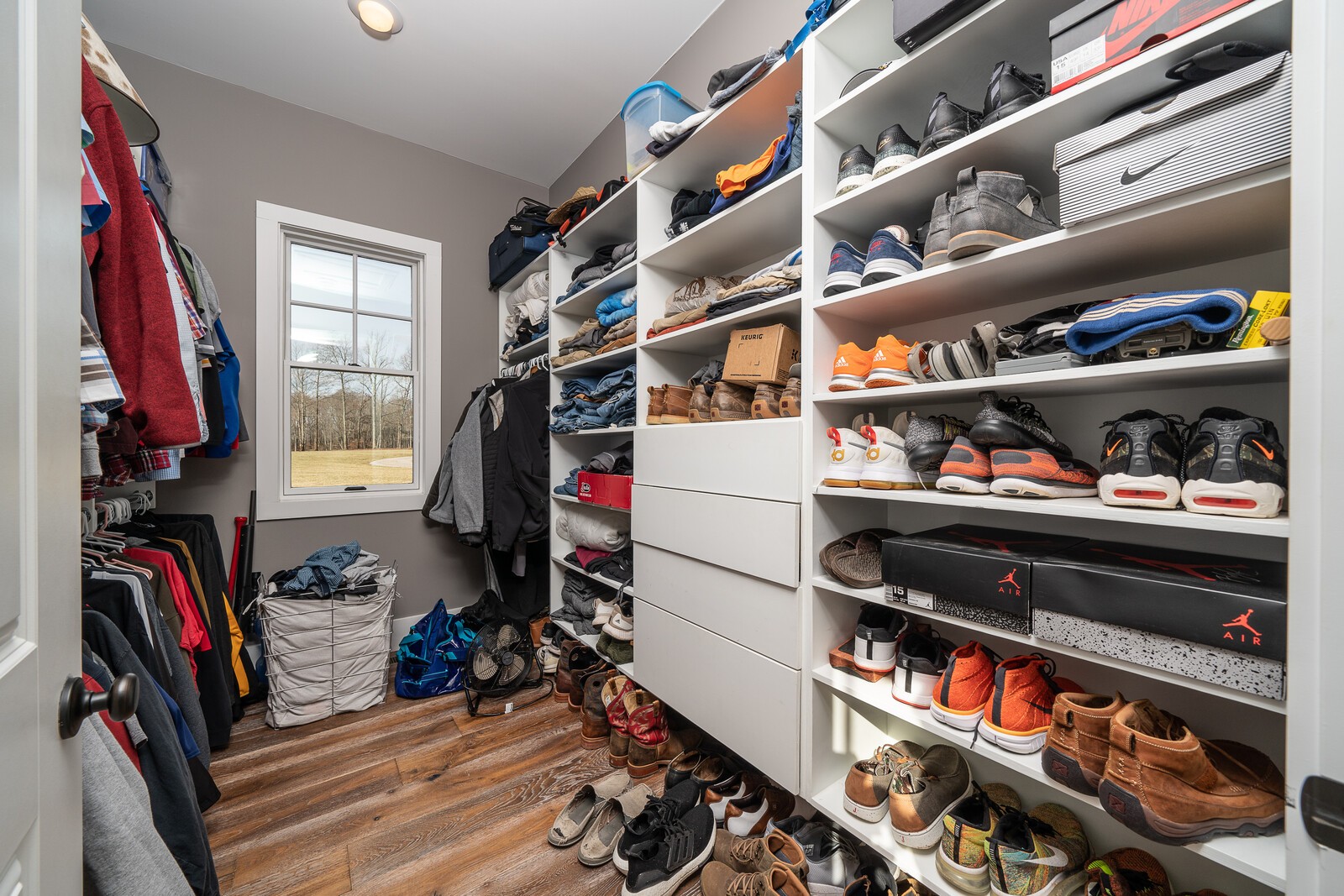 4250 Moss Road Baxter, TN 38544 - Photo 52 of 69 a view of walk in closet with clothes and shoes