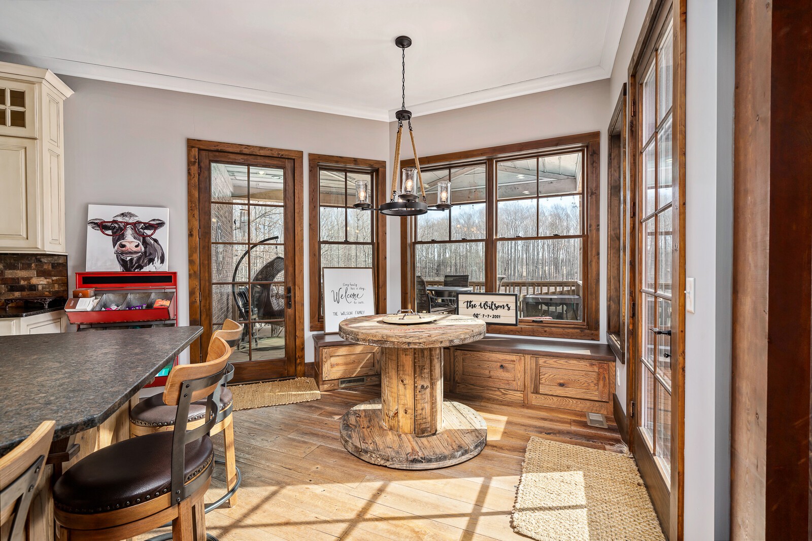 4250 Moss Road Baxter, TN 38544 - Photo 55 of 69 a view of a dining room with furniture wooden floor and a chandelier
