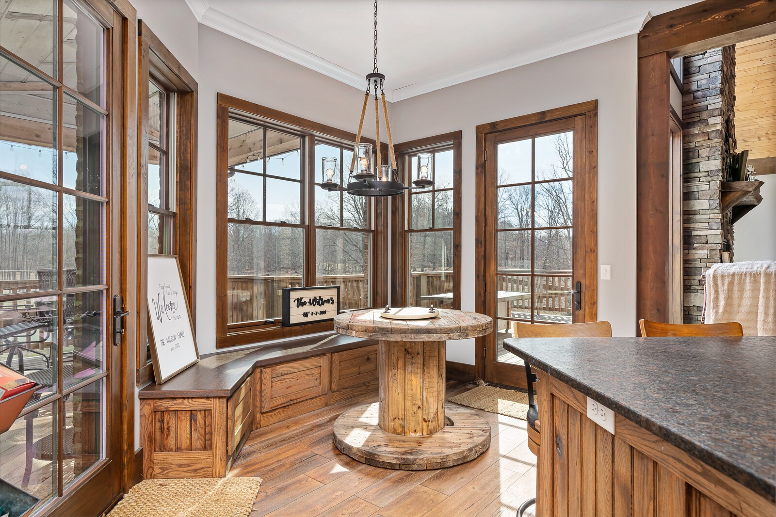 4250 Moss Road Baxter, TN 38544 - Photo 58 of 69 a view of a dining room with furniture large windows and wooden floor