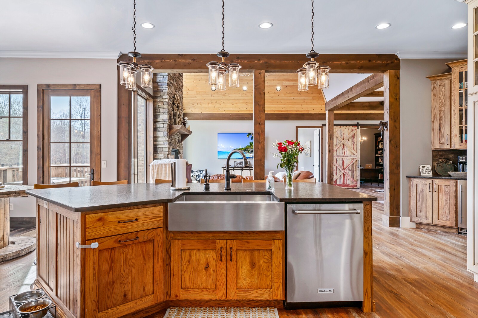 4250 Moss Road Baxter, TN 38544 - Photo 59 of 69 a kitchen with stainless steel appliances granite countertop a sink and wooden cabinets