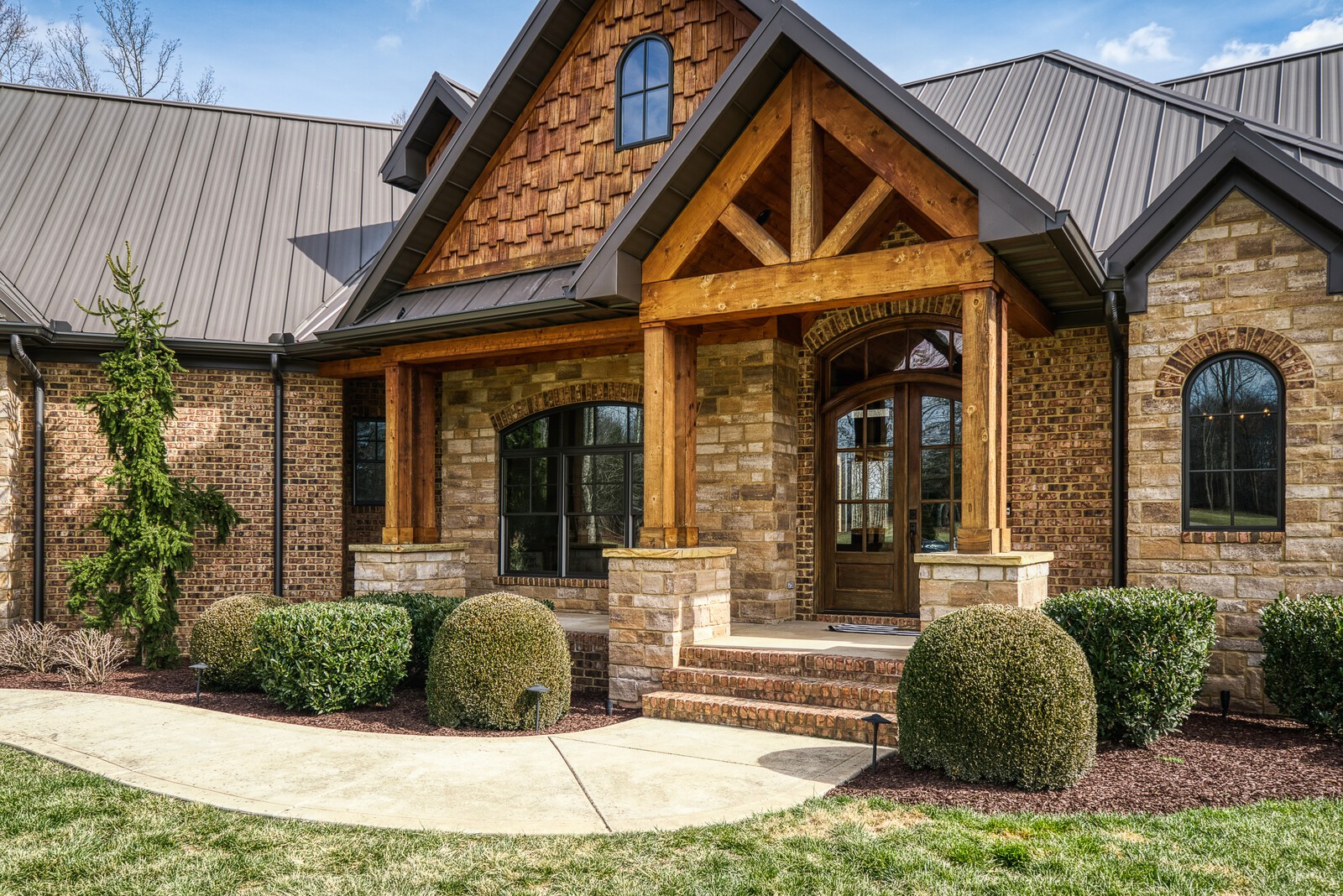 4250 Moss Road Baxter, TN 38544 - Photo 9 of 69 front view of a house with a garden