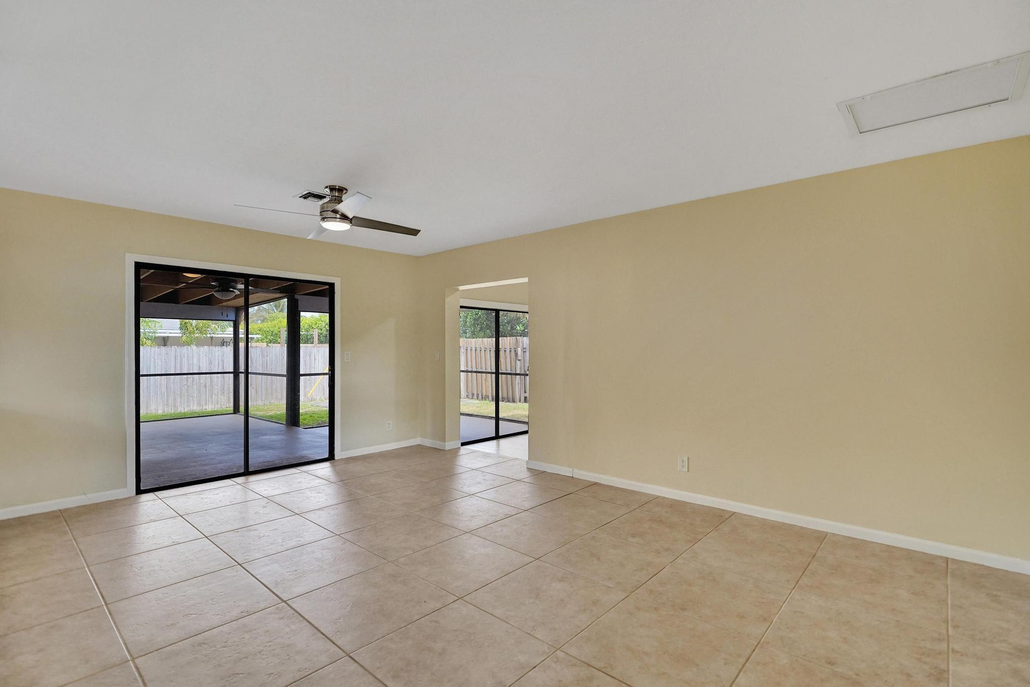 5425 Cleveland Road Delray Beach, FL 33484 - Photo 3 of 39 a view of an empty room with a window