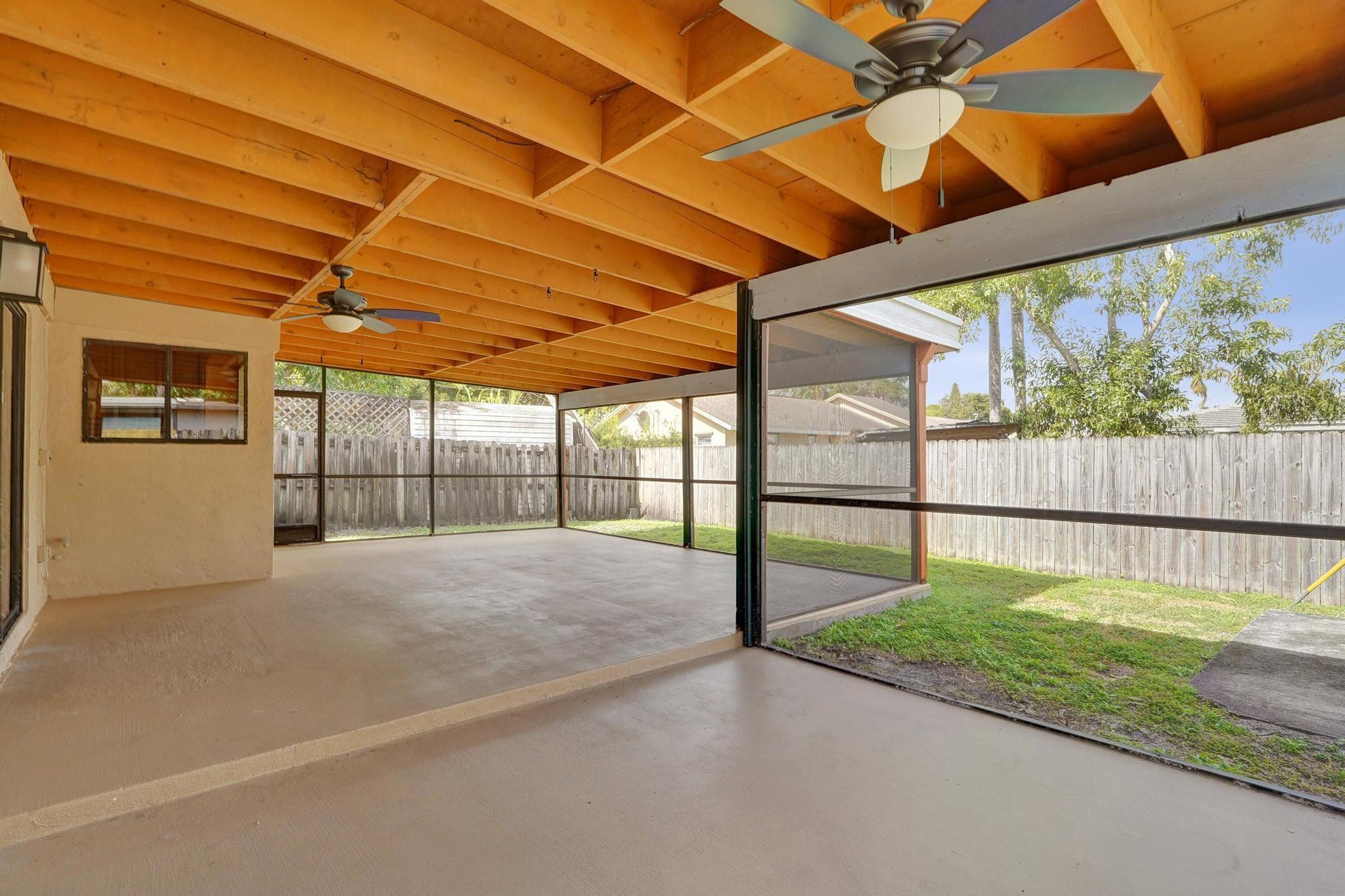 5425 Cleveland Road Delray Beach, FL 33484 - Photo 36 of 39 a view of an empty room with a window