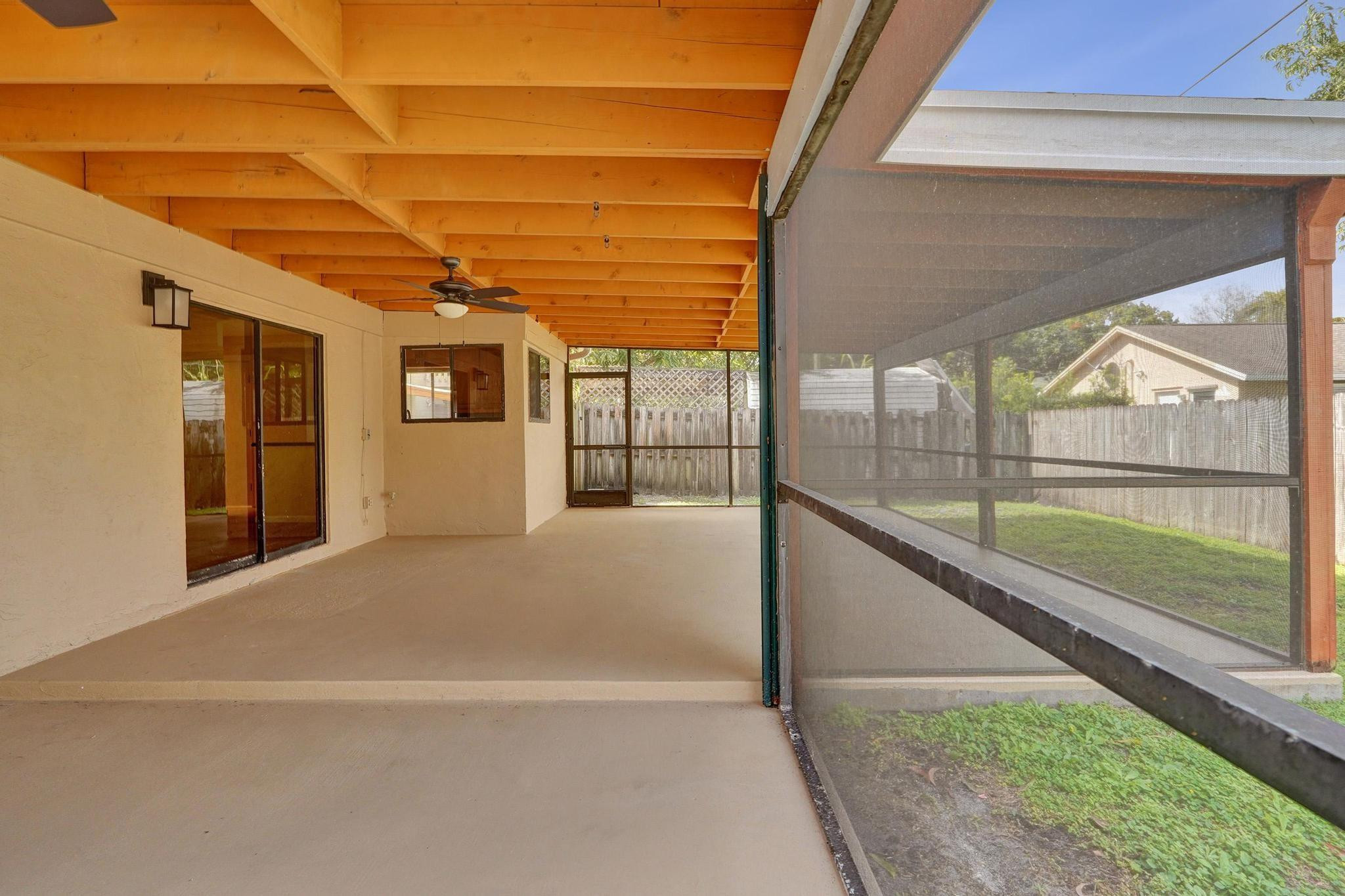 5425 Cleveland Road Delray Beach, FL 33484 - Photo 37 of 39 a view of a house with a swimming pool