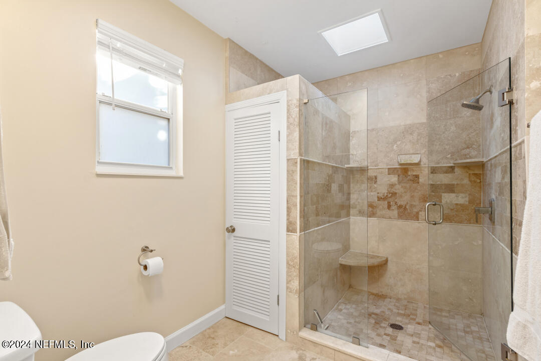 9644 Beauclerc Bluff Road Jacksonville, FL 32257 - Photo 23 of 48 a bathroom with a shower and toilet