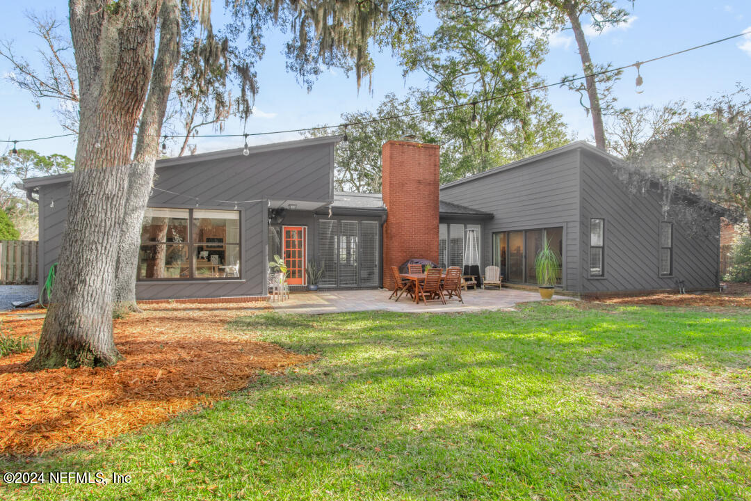 9644 Beauclerc Bluff Road Jacksonville, FL 32257 - Photo 35 of 48 a view of a house with backyard porch and sitting area