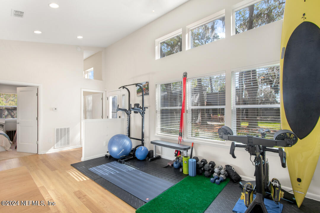 9644 Beauclerc Bluff Road Jacksonville, FL 32257 - Photo 42 of 48 a view of a room with gym equipment