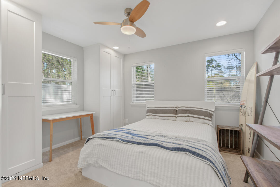 9644 Beauclerc Bluff Road Jacksonville, FL 32257 - Photo 45 of 48 a bedroom with a bed and a window