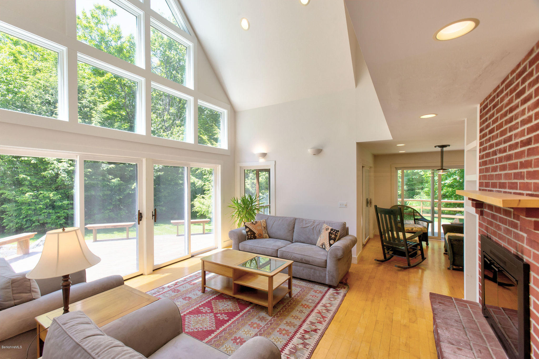 760 Dimmock Road Otis, MA 01253 - Photo 4 of 28 a living room with furniture and a fireplace