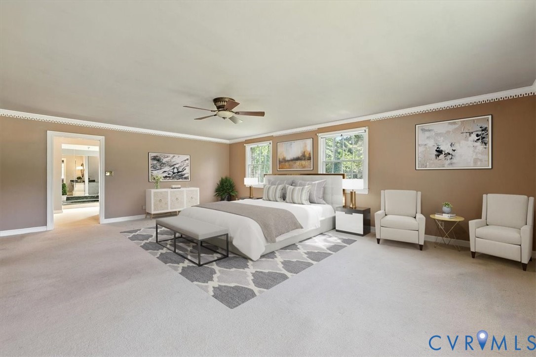 11701 Johnson Road Petersburg, VA 23805 - Photo 13 of 37 a spacious bedroom with a bed and glass window