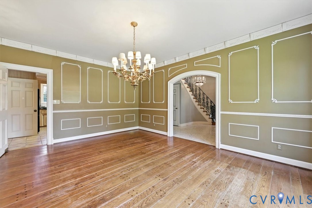11701 Johnson Road Petersburg, VA 23805 - Photo 21 of 37 a view of a room with wooden floor chandelier and entryway