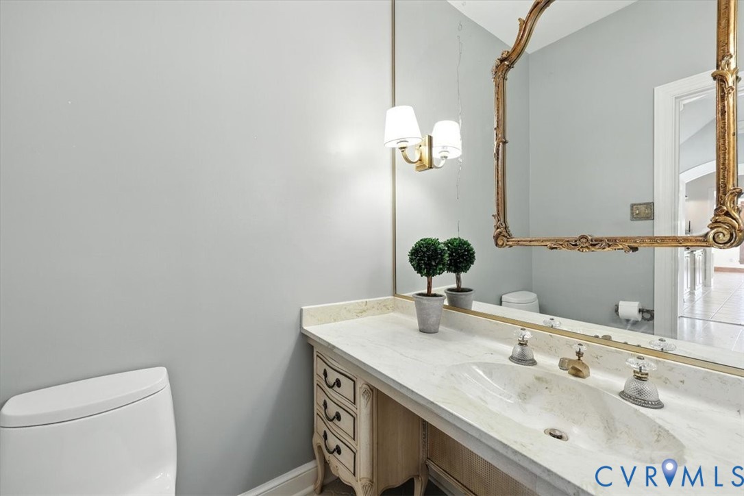 11701 Johnson Road Petersburg, VA 23805 - Photo 24 of 37 a bathroom with a sink and a mirror