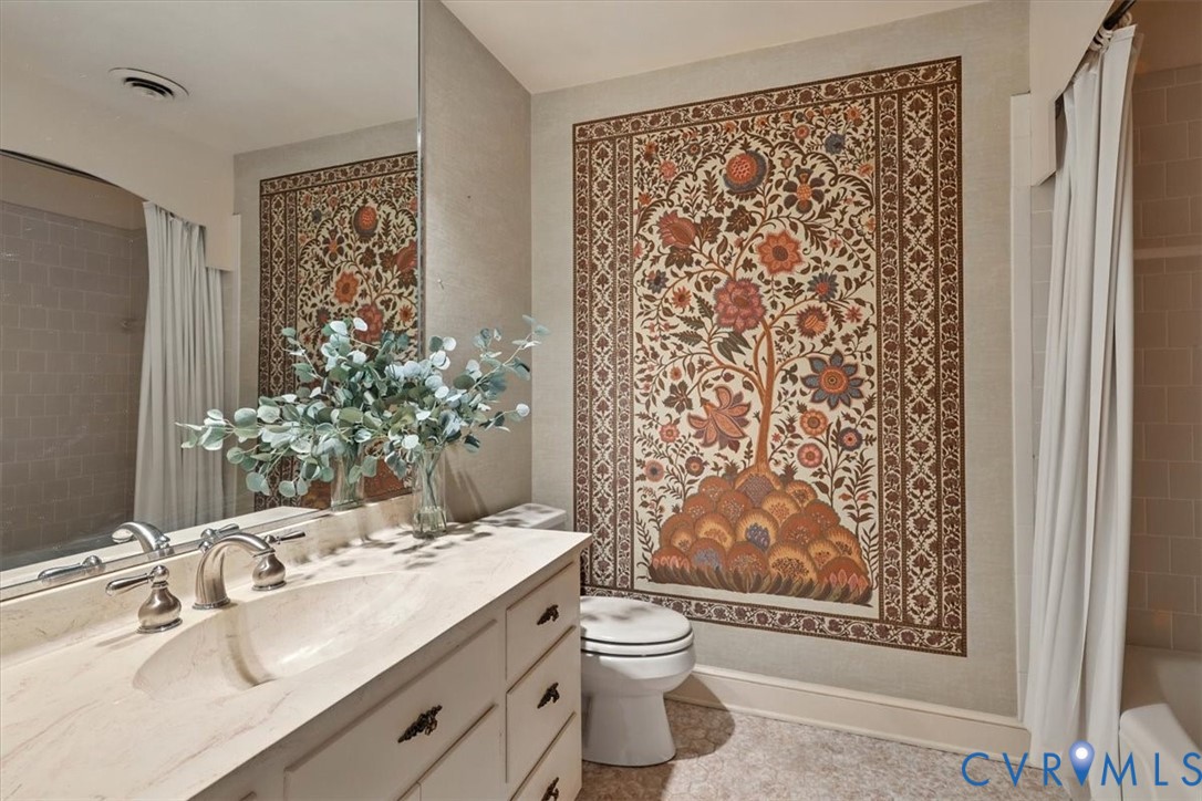 11701 Johnson Road Petersburg, VA 23805 - Photo 30 of 37 a bathroom with a granite countertop sink toilet and shower