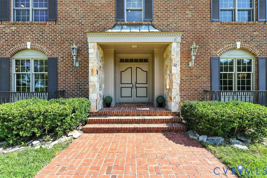 11701 Johnson Road Petersburg, VA 23805 - Photo 3 of 37 a front view of a house with a porch