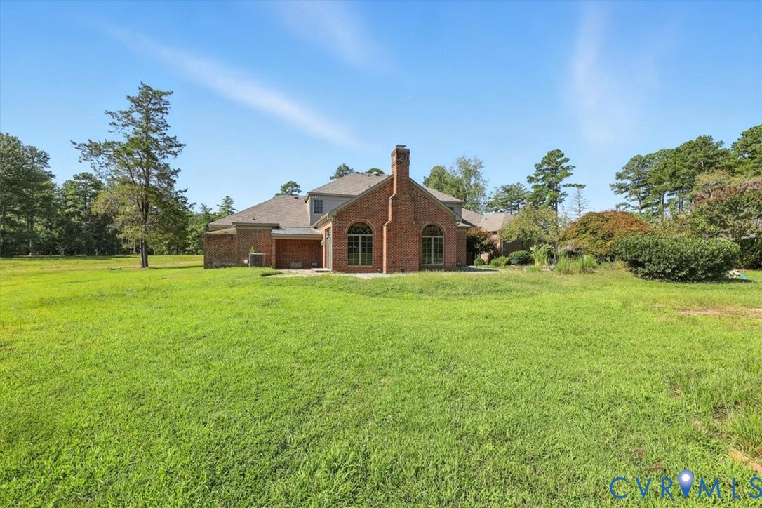 11701 Johnson Road Petersburg, VA 23805 - Photo 35 of 37 a front view of a house with garden