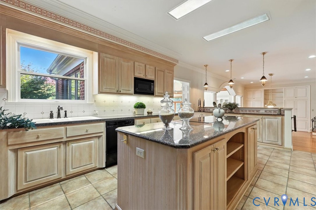11701 Johnson Road Petersburg, VA 23805 - Photo 5 of 37 a kitchen with a sink stove and cabinets