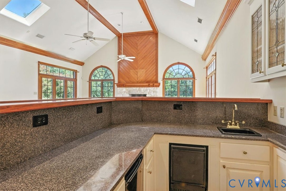 11701 Johnson Road Petersburg, VA 23805 - Photo 10 of 37 a kitchen with a sink a stove and cabinets