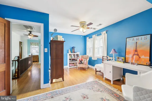 a bathroom with a sink a toilet and vanity