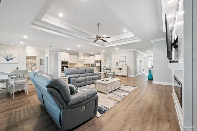 a kitchen with stainless steel appliances granite countertop a stove microwave and refrigerator