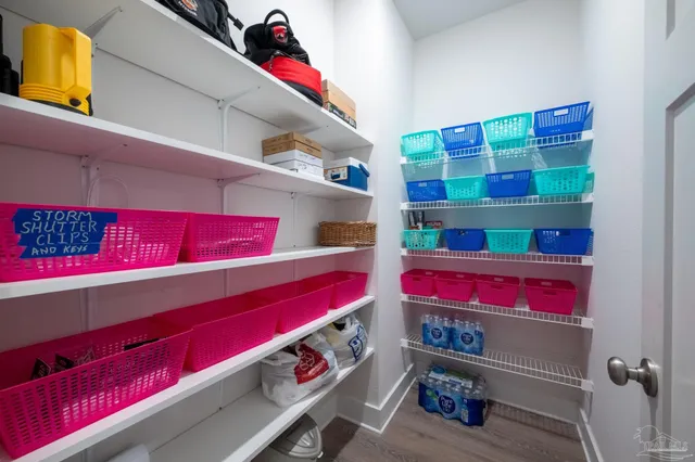 a spacious bathroom with a granite countertop sink mirror and