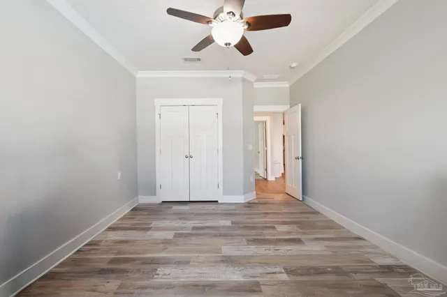 front view of a house with a swimming pool