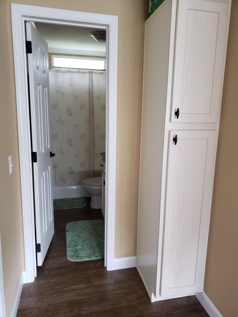7381 Peaceful Acres Road Greenbrier, TN 37073 - Photo 14 of 15 a bathroom with a glass shower door