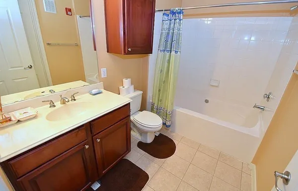 a bathroom with a sink a toilet and a bathtub