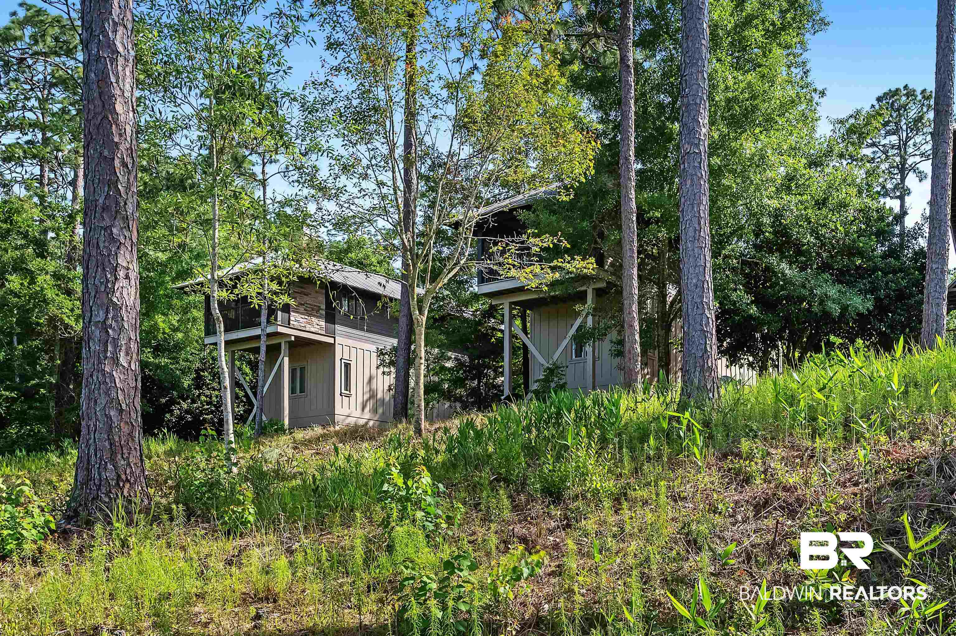32760 Steelwood Ridge Road, Unit 7 Loxley, AL 36551 - Photo 45 of 64 Back of property featuring a deck