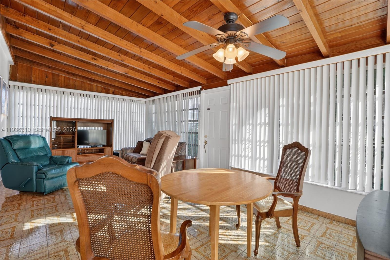 1633 Southwest 30th Avenue Miami, FL 33145 - Photo 12 of 30 a view of a dining room with furniture