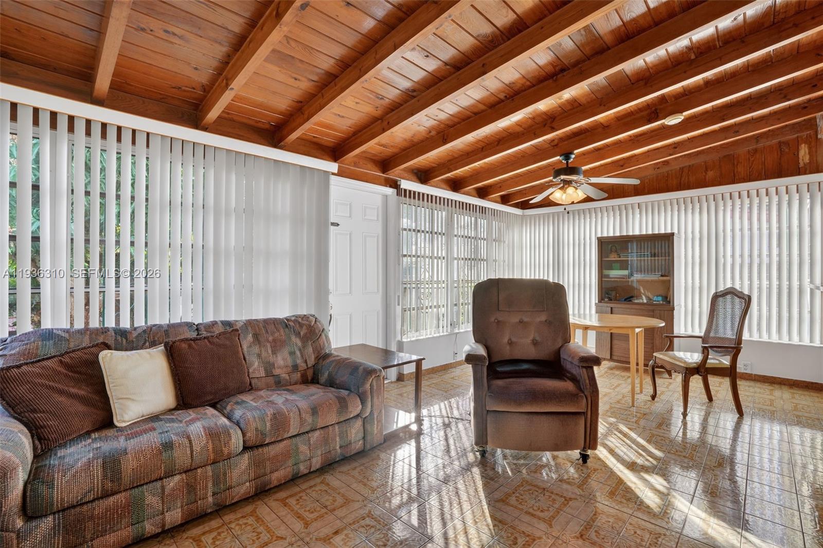 1633 Southwest 30th Avenue Miami, FL 33145 - Photo 13 of 30 a living room with furniture and wooden floor