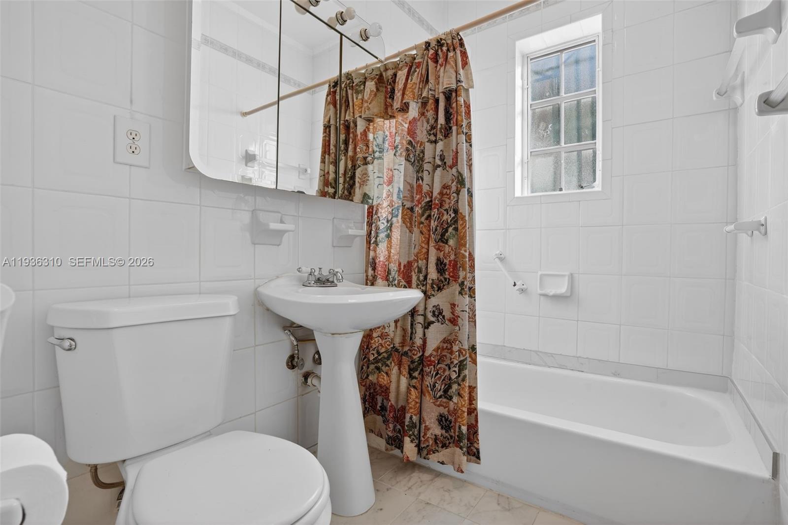 1633 Southwest 30th Avenue Miami, FL 33145 - Photo 18 of 30 a bathroom with a sink toilet and shower