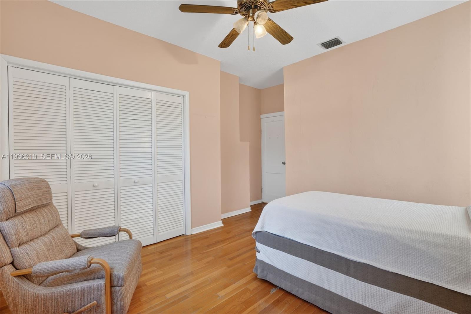 1633 Southwest 30th Avenue Miami, FL 33145 - Photo 20 of 30 a bedroom with a bed and furniture