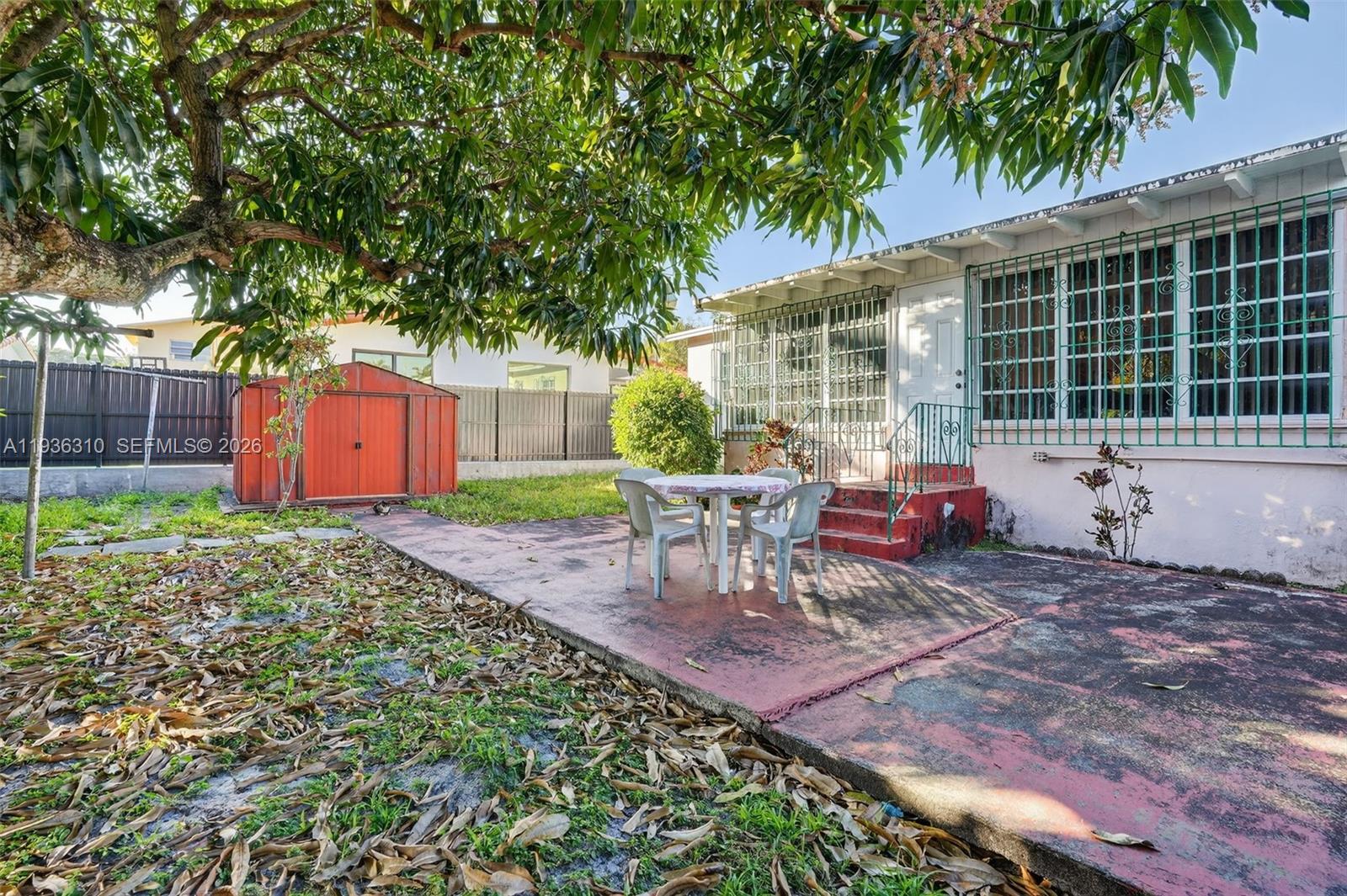 1633 Southwest 30th Avenue Miami, FL 33145 - Photo 23 of 30 a view of a backyard with sitting area and garden