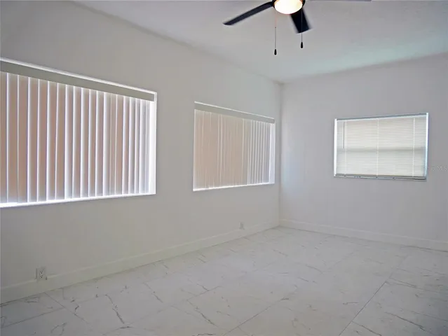 a bathroom with a sink vanity and mirror