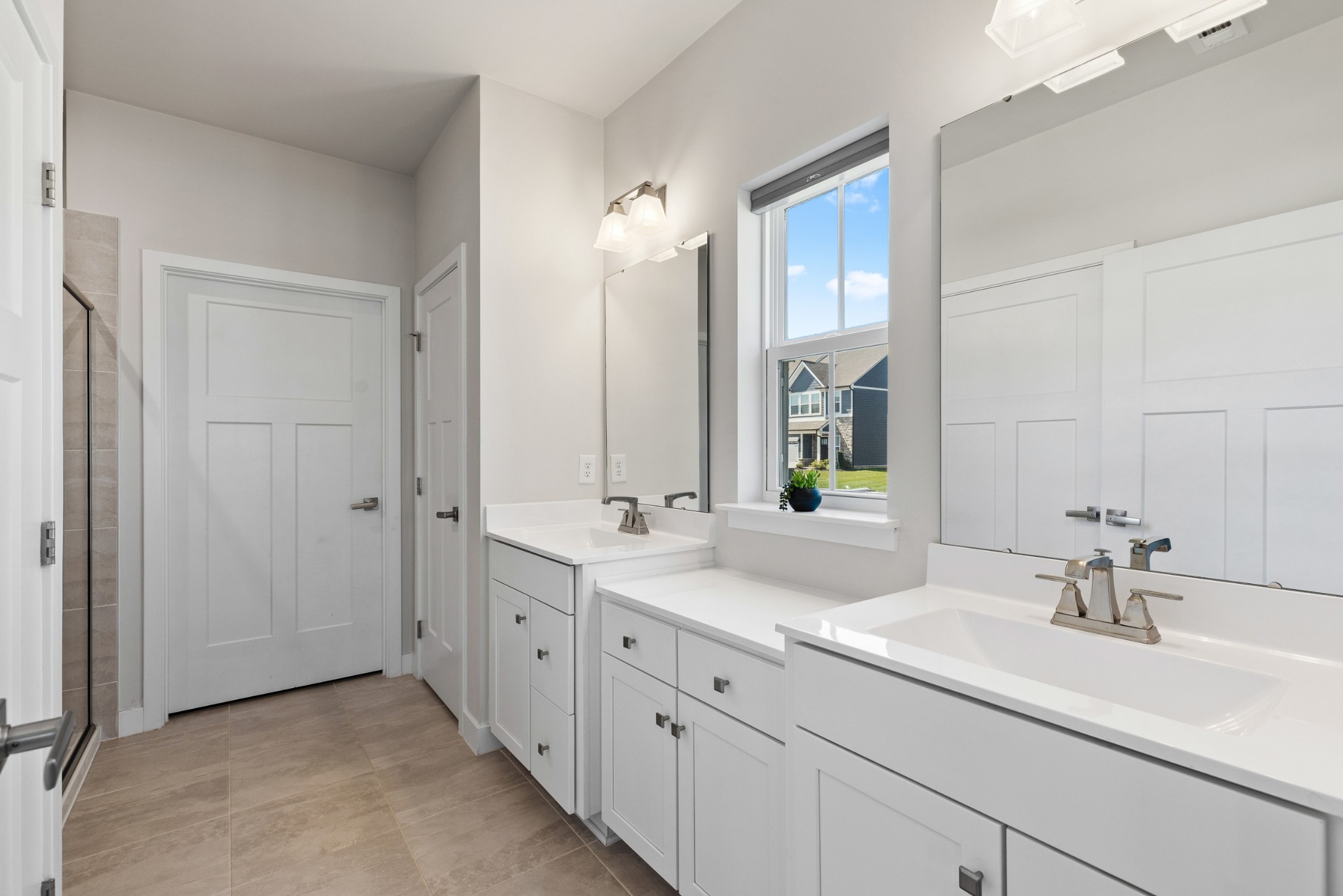 203 Pitchfork Way Gallatin, TN 37066 - Photo 26 of 39 a bathroom with double sink and a mirror