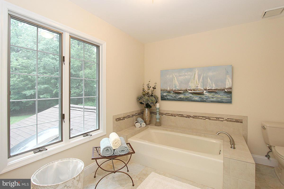 8212 Honeysuckle Road Manassas, VA 20112 - Photo 19 of 30 Sunny Master Bath with Soaking Tub