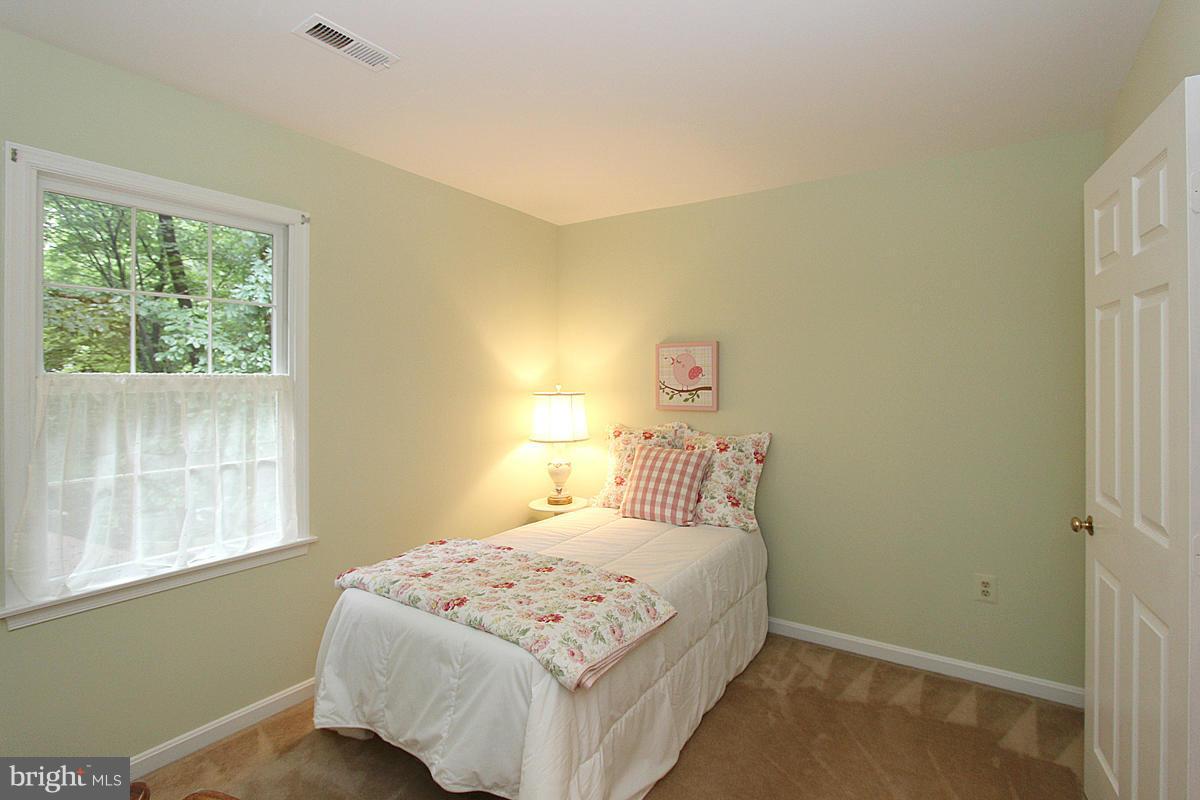 8212 Honeysuckle Road Manassas, VA 20112 - Photo 20 of 30 Bedroom 2 with Walk In Closet