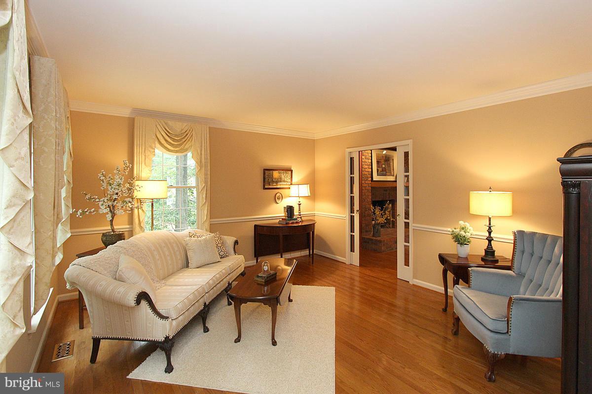 8212 Honeysuckle Road Manassas, VA 20112 - Photo 4 of 30 Living Room with Gleaming Hardwood Floor