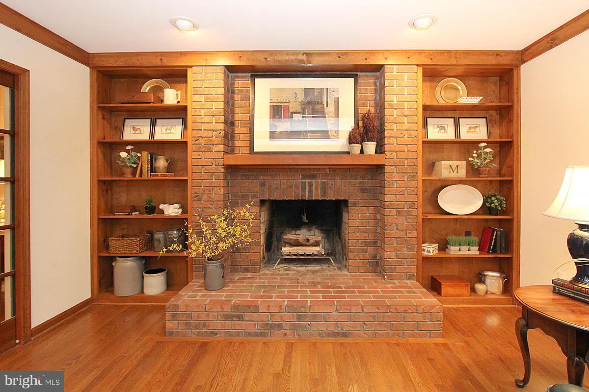 8212 Honeysuckle Road Manassas, VA 20112 - Photo 8 of 30 Wood Burning Fireplace and Built In Bookcases