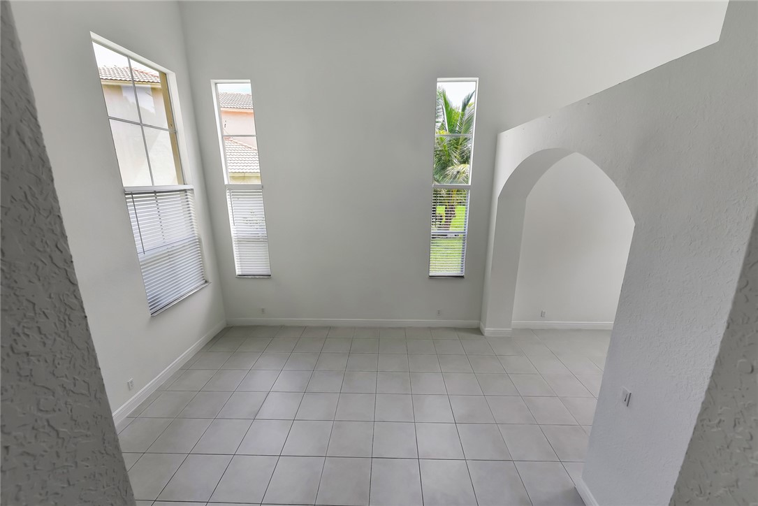5513 Spanish River Road Fort Pierce, FL 34951 - Photo 17 of 33 a view of an empty room with a window