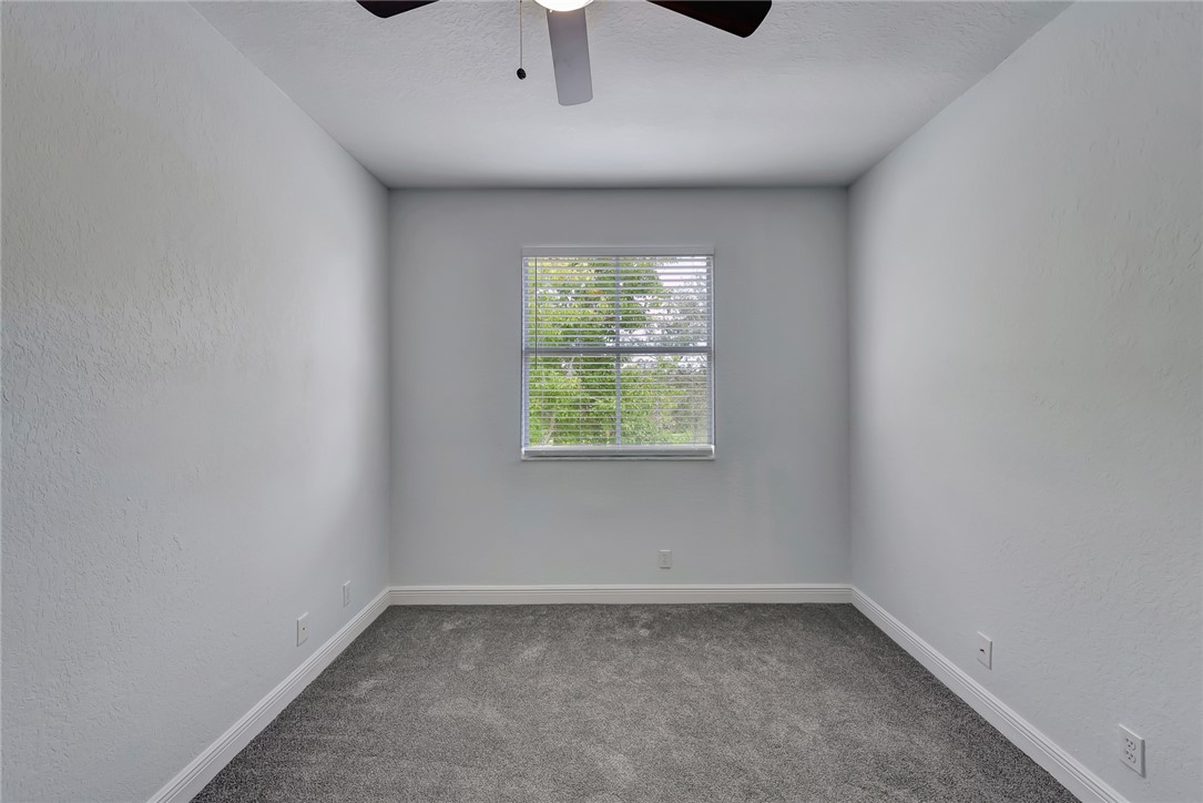 5513 Spanish River Road Fort Pierce, FL 34951 - Photo 22 of 33 an empty room with a window