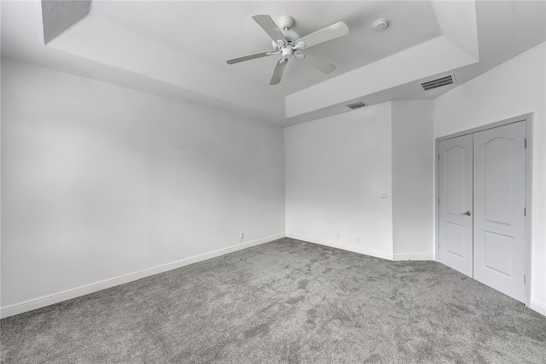 5513 Spanish River Road Fort Pierce, FL 34951 - Photo 25 of 33 a view of a ceiling fan in a room