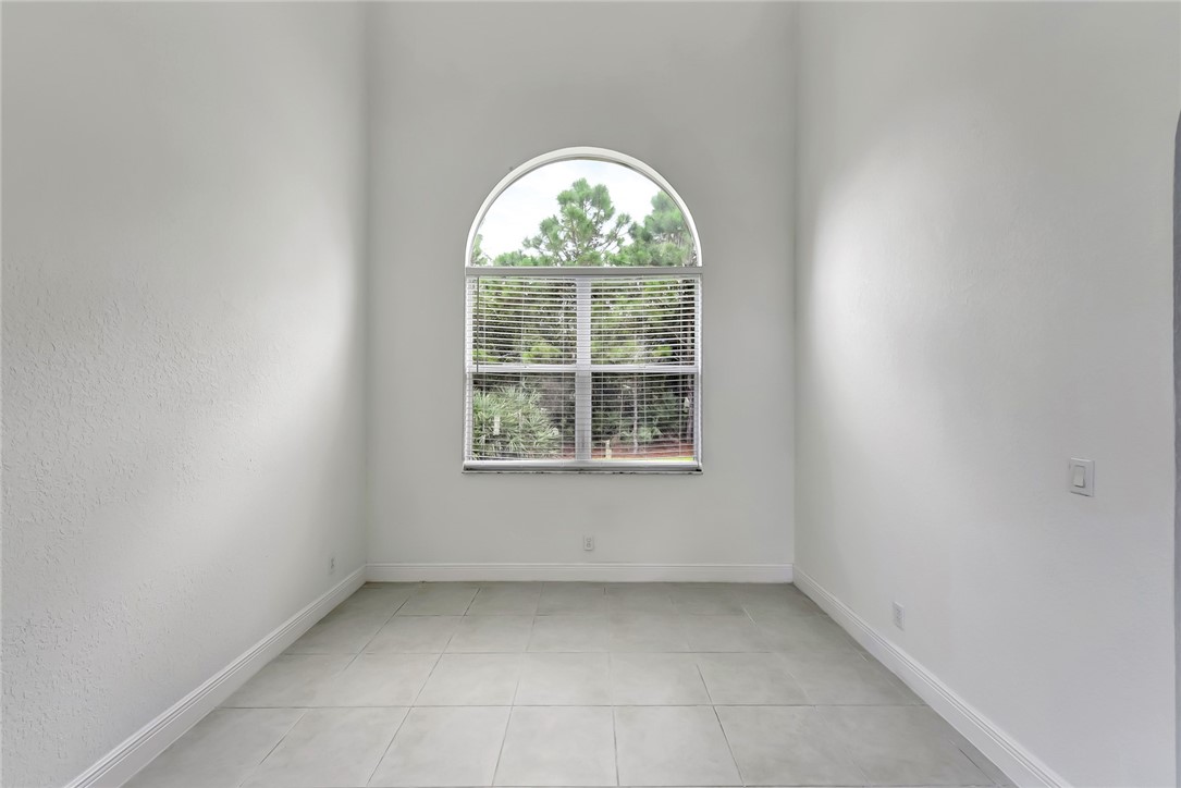 5513 Spanish River Road Fort Pierce, FL 34951 - Photo 32 of 33 an empty room with a window