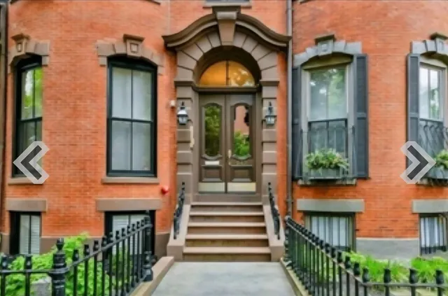 an entrance to house with yard