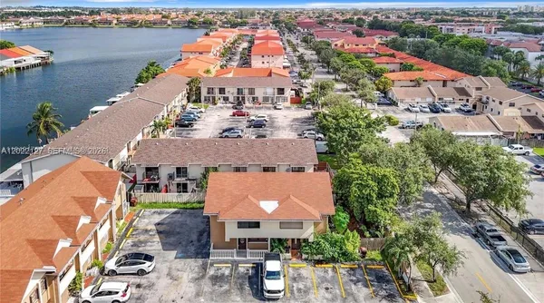 an aerial view of a house with outdoor space